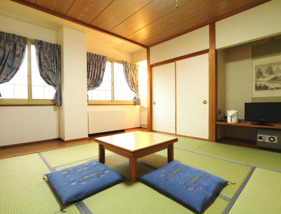 Hakuba Tsugaike Sunrise Tanne Hotel Otari Exterior foto
